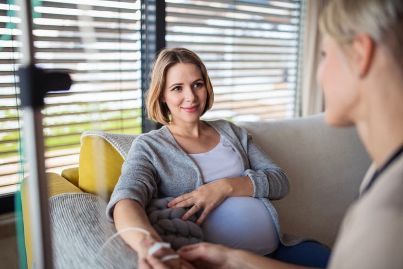Pregnant woman receiving IV therapy at home in Coral Springs, FL for safe and comfortable hydration support.